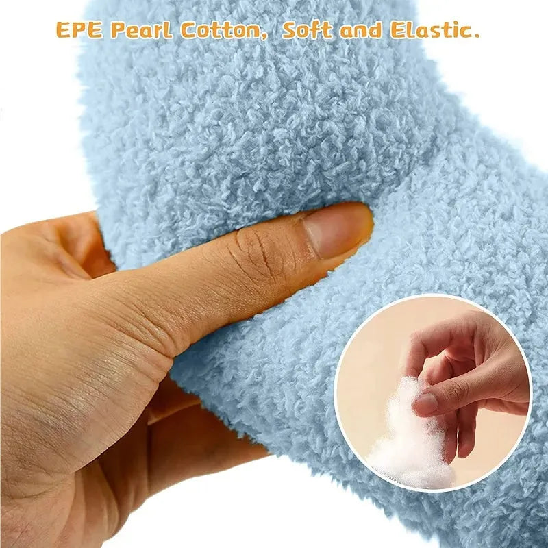 Plush U-shaped pet pillow for small cats and dogs in blue, showing quilted faux fur texture.