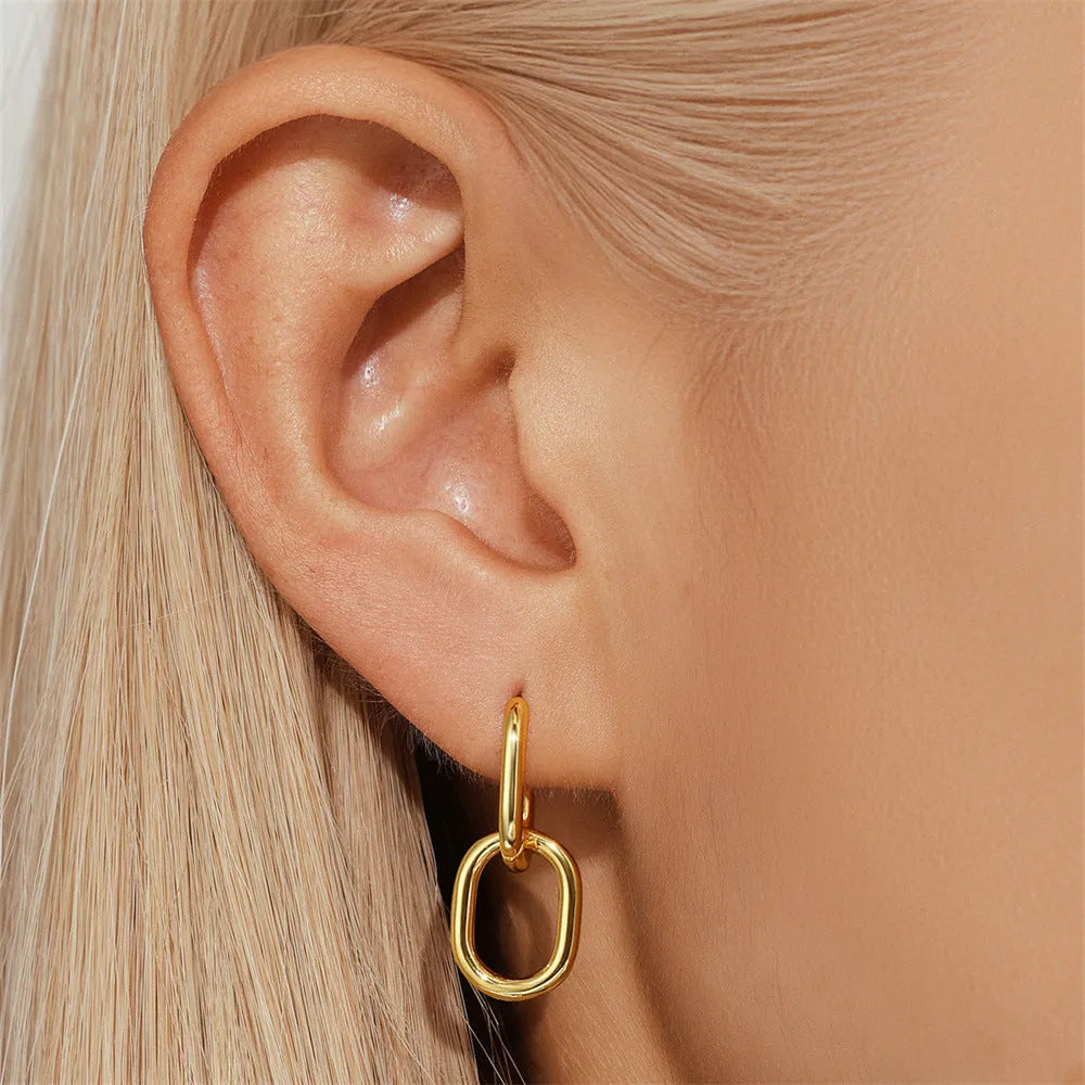 Brass geometric earclip earrings with electroplated golden finish, round shape design