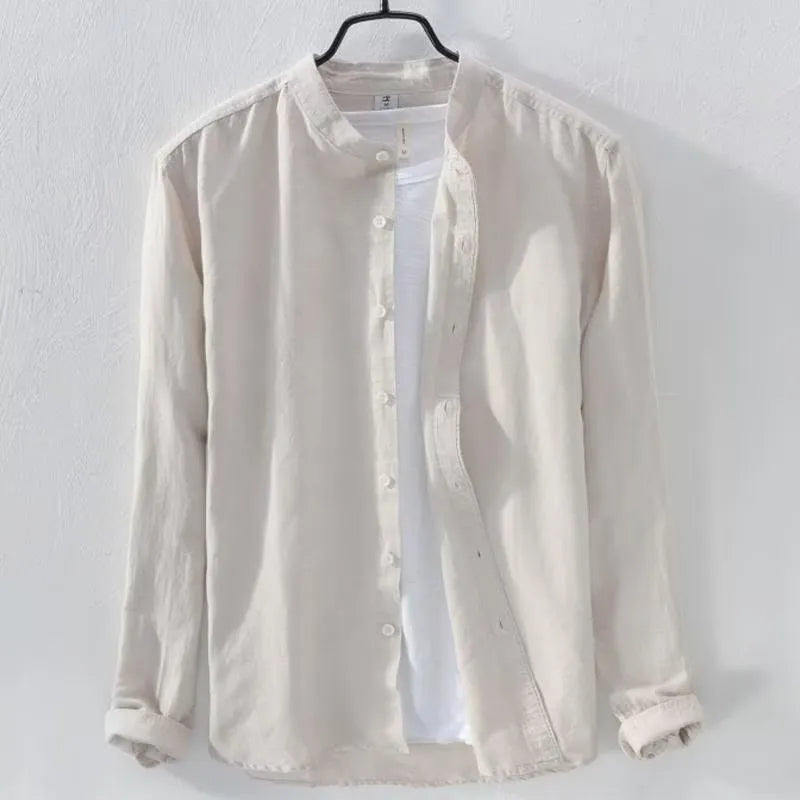 Loose fit long sleeve cotton linen shirt in solid colours on a hanger.