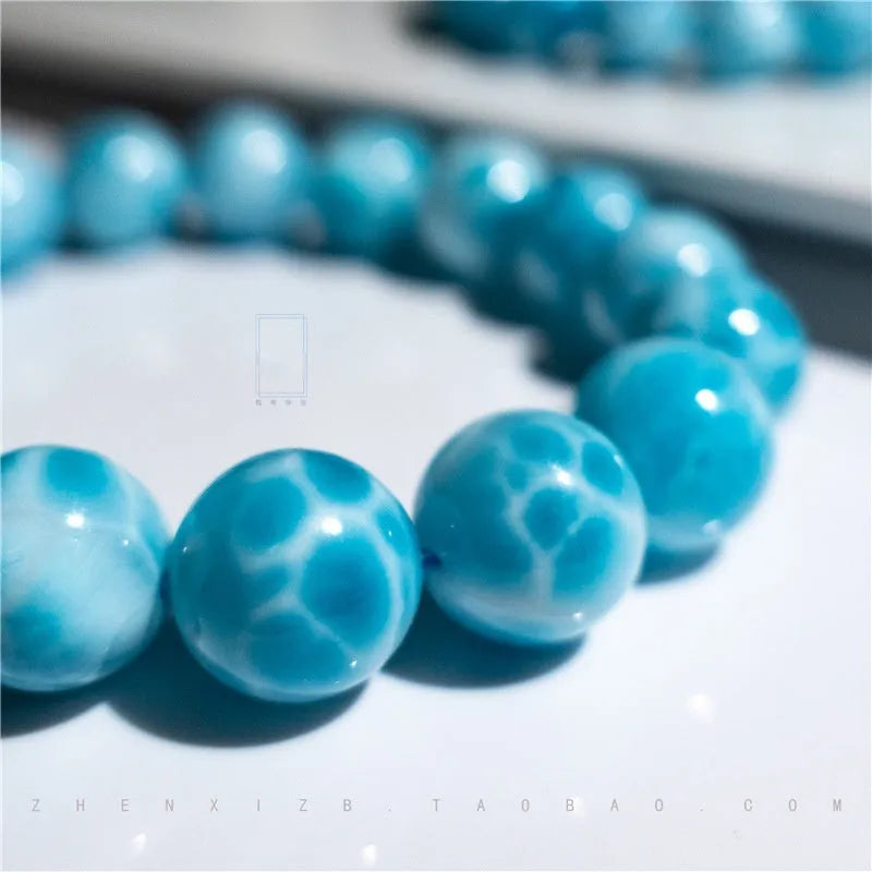 A blue sea-pattern stone and pearl bodhi bracelet in Maillard style, shown in various sizes from 6mm to 14mm.