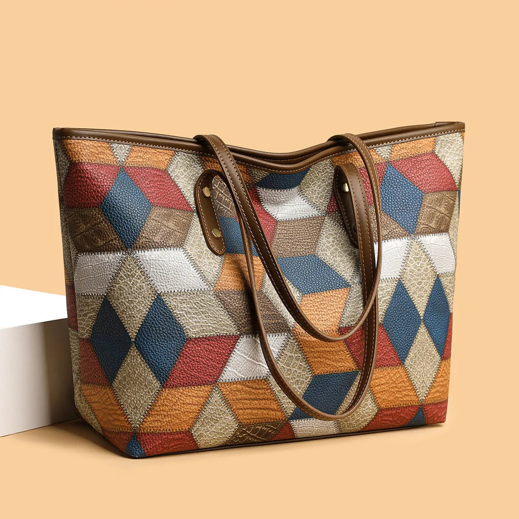Women's large capacity PVC handbag in blue brown colour with sandwich pocket design and shoulder strap
