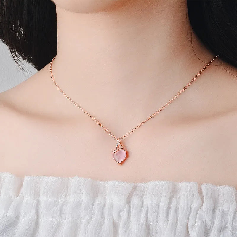 Women's heart-shaped synthetic crystal pendant necklace with rose gold cross chain
