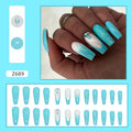 Long ballet artificial nails in smart blue diamond colour with glitter debris particles