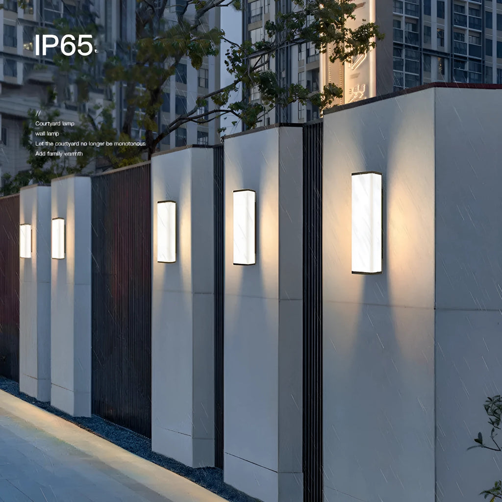 Slender stainless steel outdoor wall light with PC shade, 60cm high, for waterproof courtyard and park lighting.