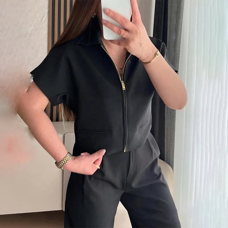 Loose-fit casual top with short sleeves in polyester fabric showing black, white, and yellow colour options