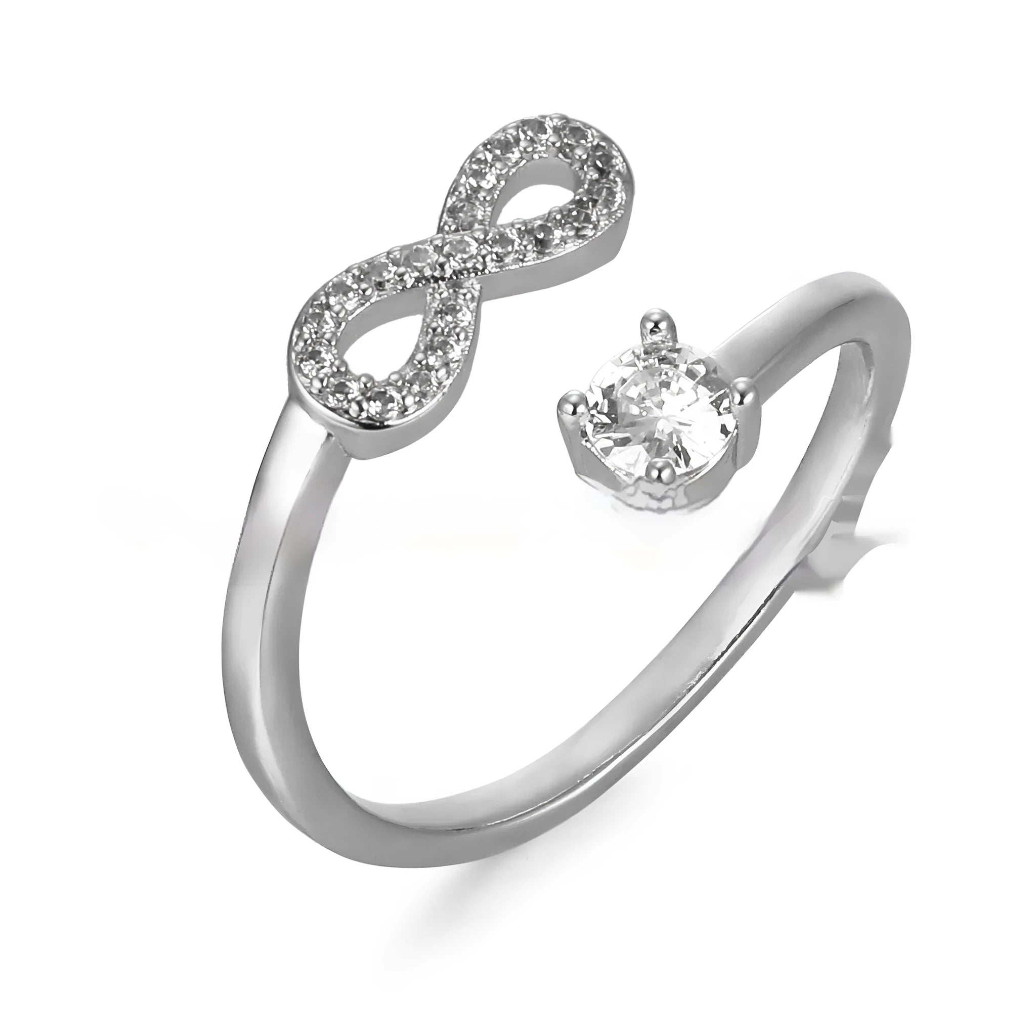 Geometric diamond-cut letter ring with zircon inlay, shown in gold, rose gold, and silver.