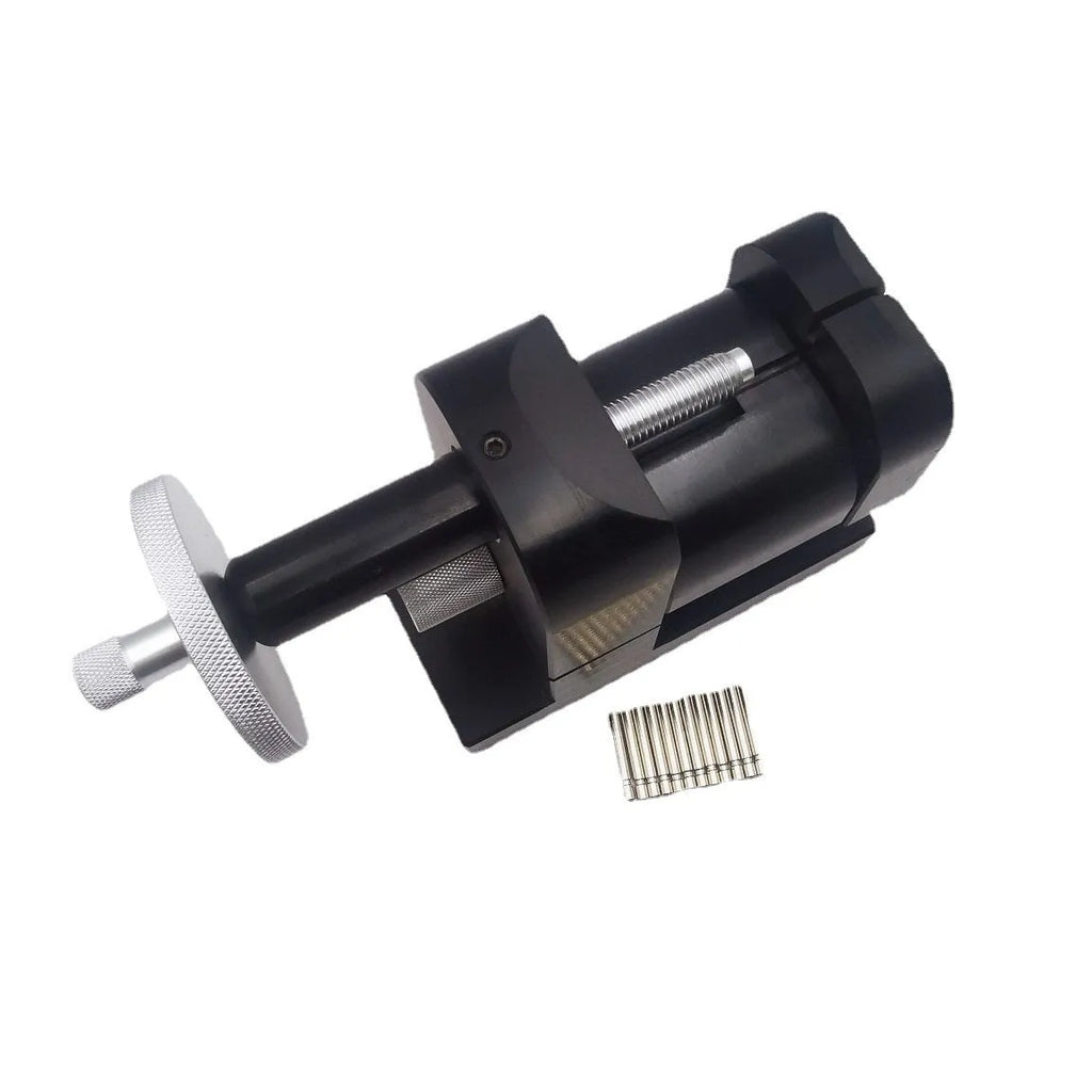 Alloy steel watch strap removal machine with bench mount frame and tool components for watch repair