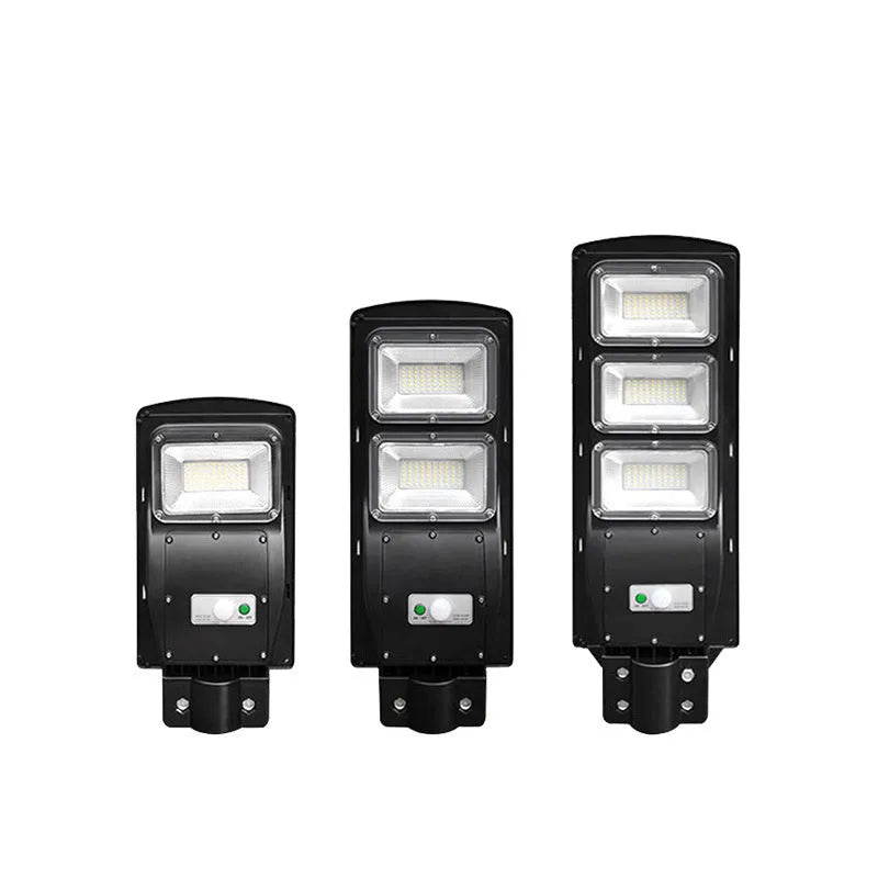 Integrated solar street light unit with solar panel and LED light in single housing for outdoor use