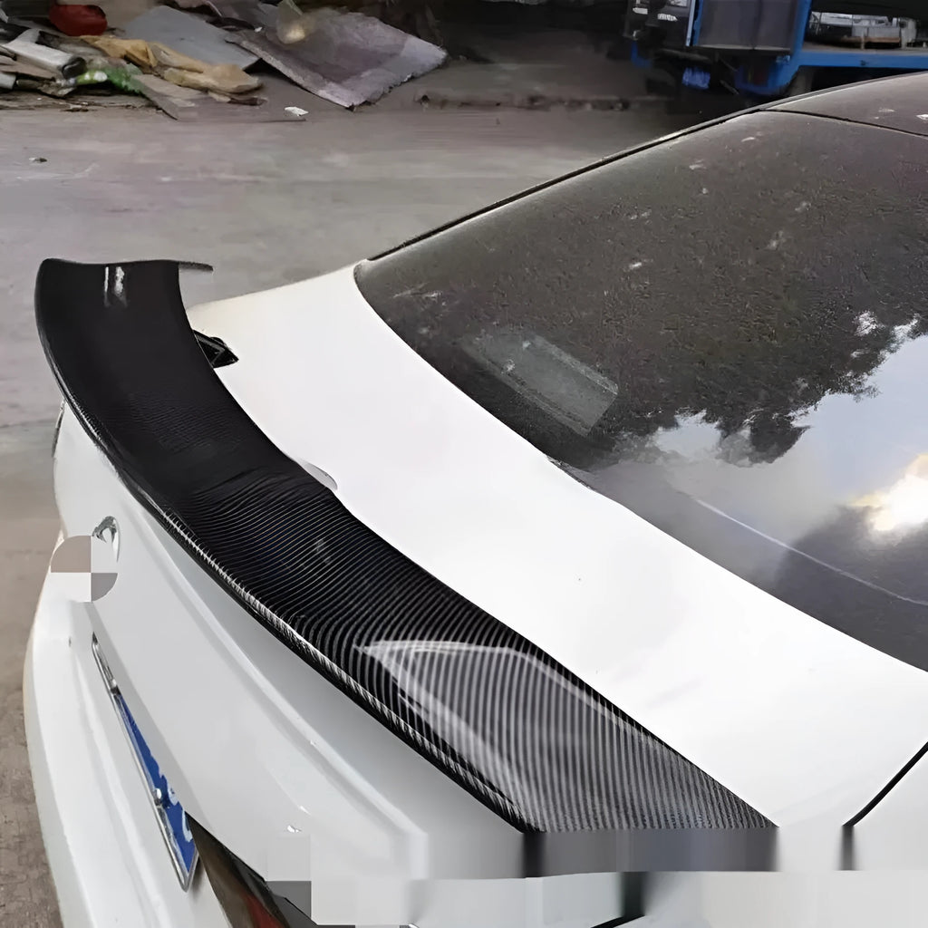 Universal punch-free ABS plastic car spoiler tail wing in a choice of finishes.
