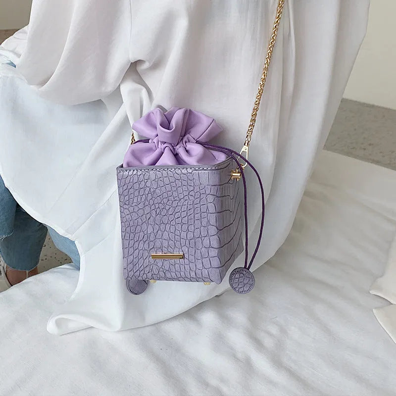 Korean style one shoulder messenger bag with chain detailing and bucket shape in multiple colour options