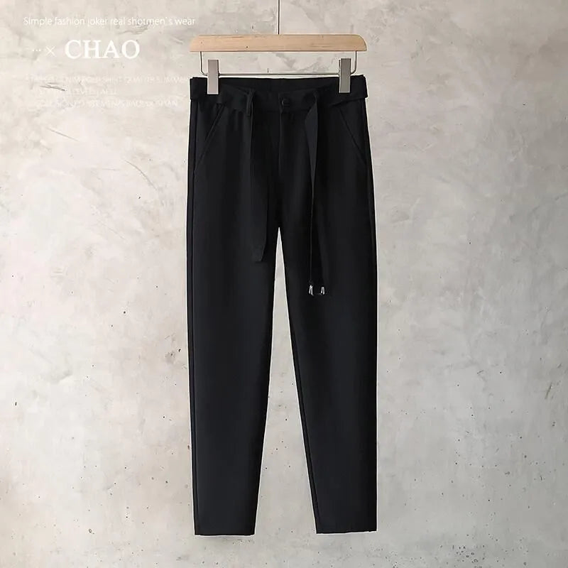 Boys slim straight tapered trousers in wool blend fabric, shown in black, white, dark grey and light grey