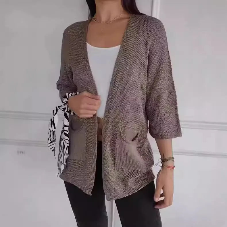 Women's waffle texture cardigan coat with nine-quarter sleeves in army green colour showing pocket details