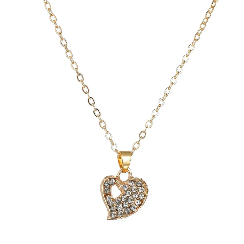 Gold electroplated alloy jewellery set with earrings, pendant necklace and bracelet for women