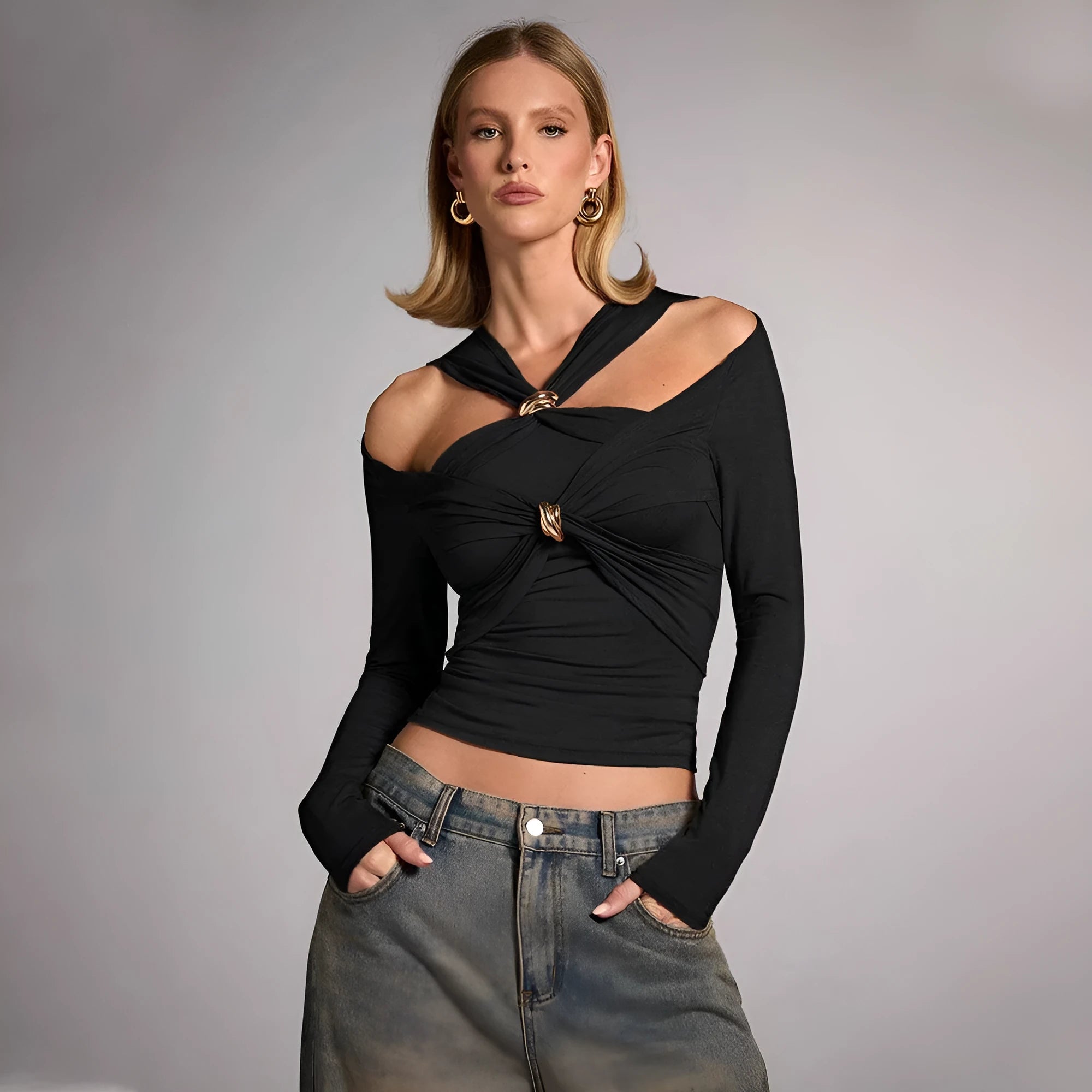 Black women's halter neck top with long sleeves and slim fit silhouette