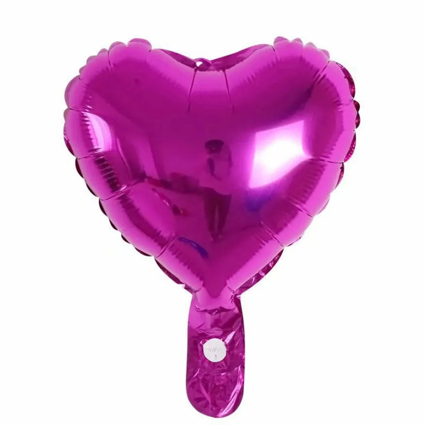Five peach heart shaped aluminum balloons in metallic colours for party decorations