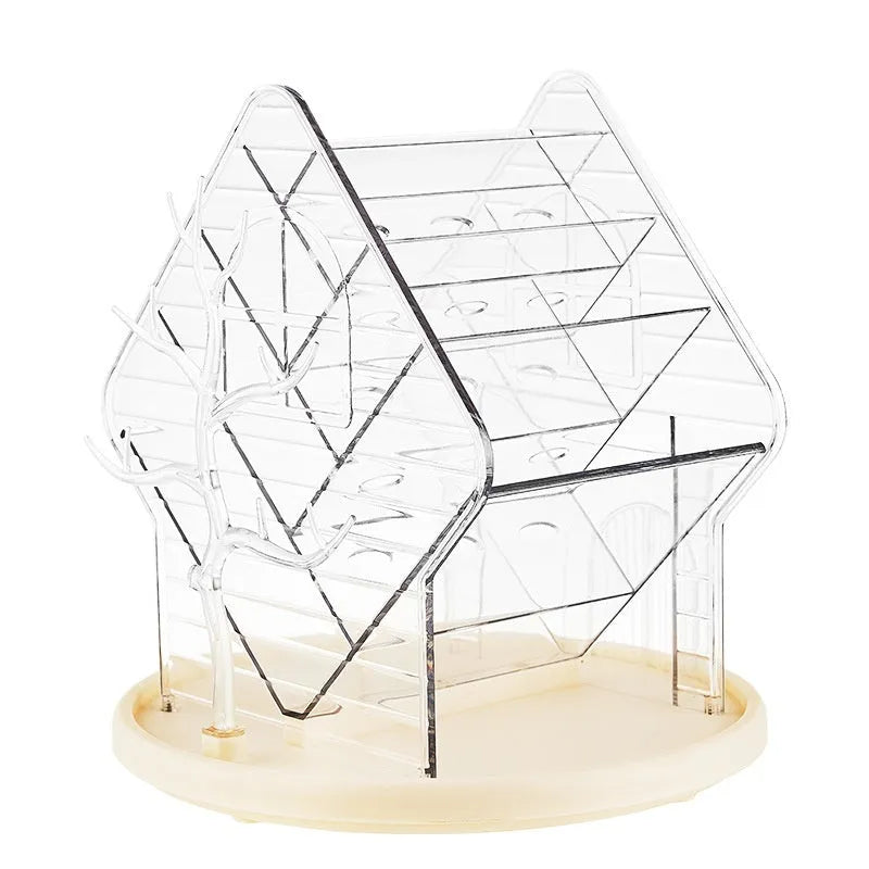 Clear and amber gold rotating plastic cosmetics storage box on a vanity.