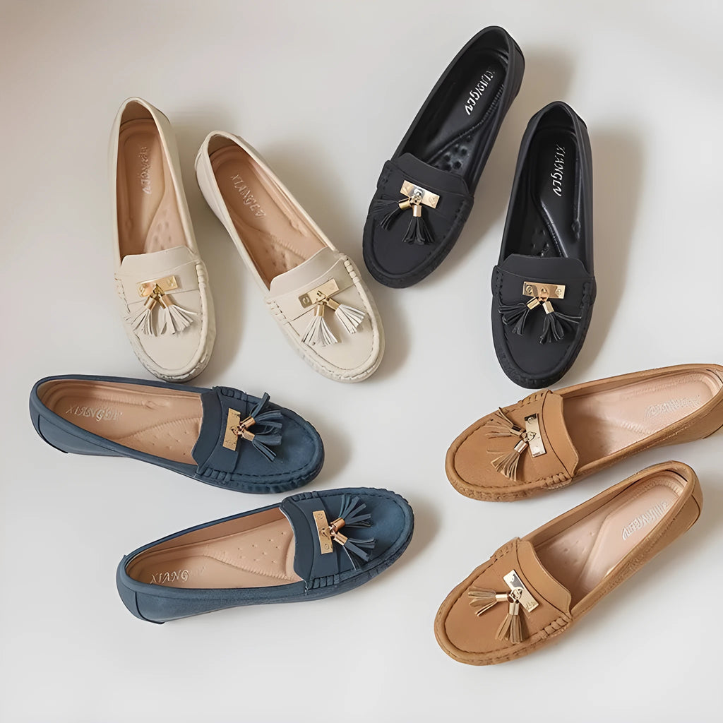 Nude casual work shoes with round toe and mid heel on a white background.