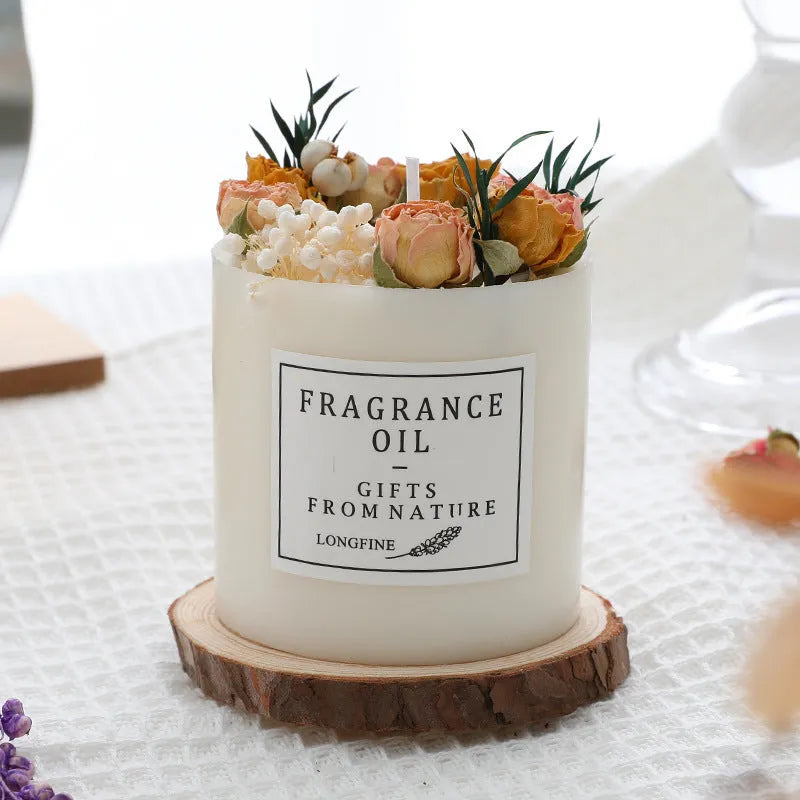 330g aromatherapy candle with embedded dried flowers, available in nine fragrances with optional gift box and wooden base