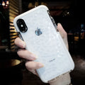 Flexible TPU iPhone case with striped back design in black, pink, and white border options.