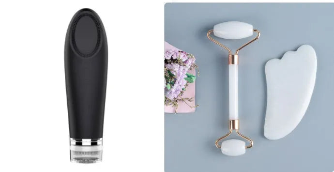White jade facial roller and matching massage board set on a flat surface.