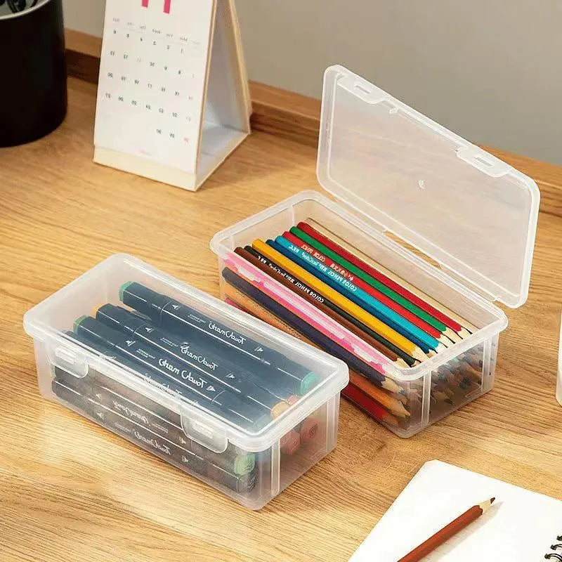 Transparent plastic pencil storage box with large capacity for crayons and colouring pencils.