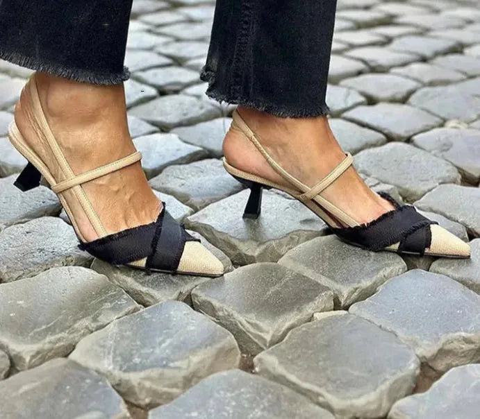 Women's apricot and black colour block stiletto sandals with a pointed toe and buckle fastening.