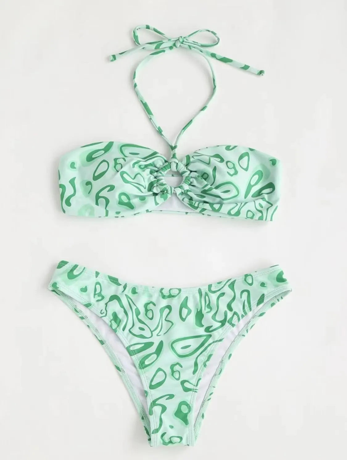Women's blue floral bandeau bikini swimsuit with split style design on mannequin