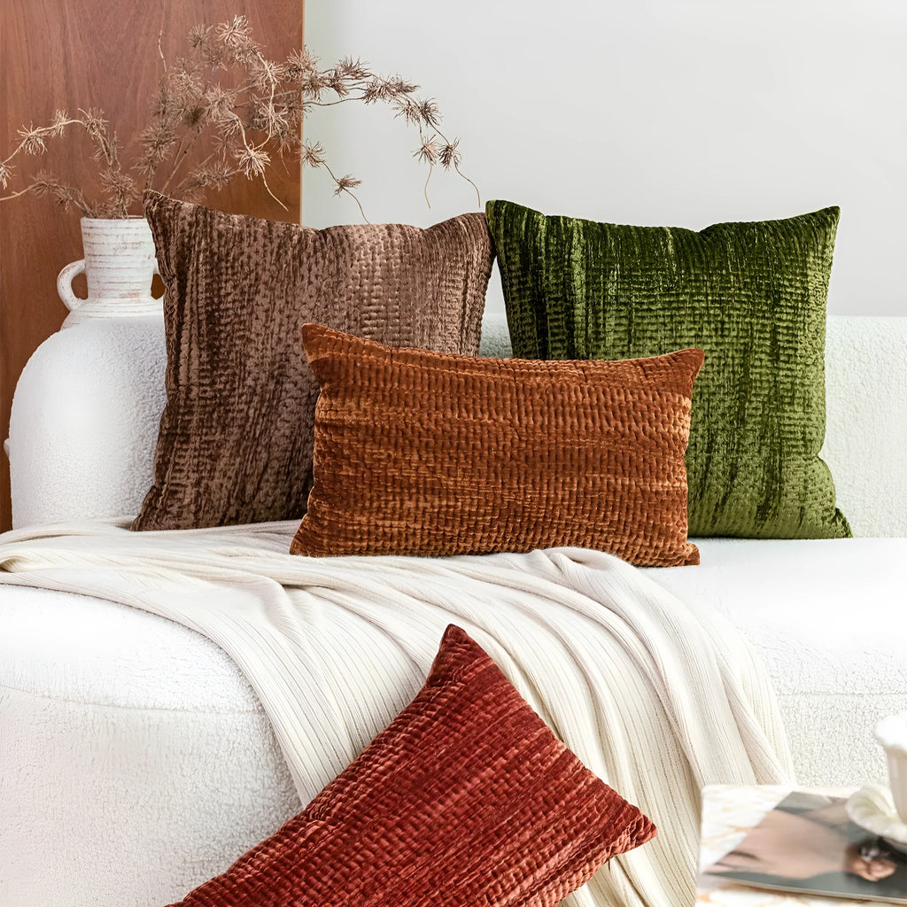 Quilted mercerised velvet cushion pillow in antique style texture on sofa