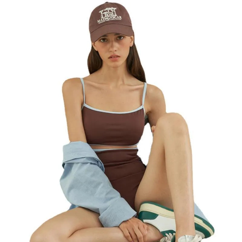 Brown women's triangle one-piece swimsuit on a hanger, sizes M L XL available.