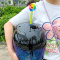 Swinging silicone sunflower decoration with suction cup for motorcycle or bicycle helmet.