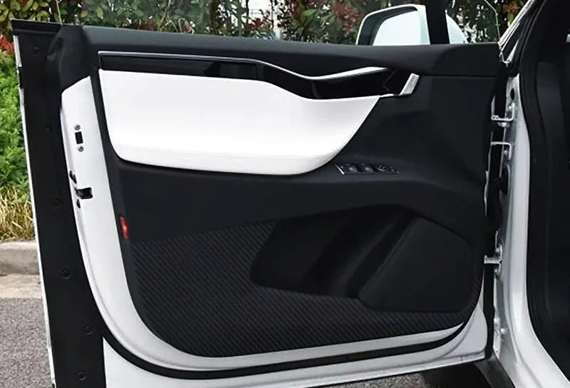 Carbon fibre anti-scratch protective film kit for Tesla Model S car doors.