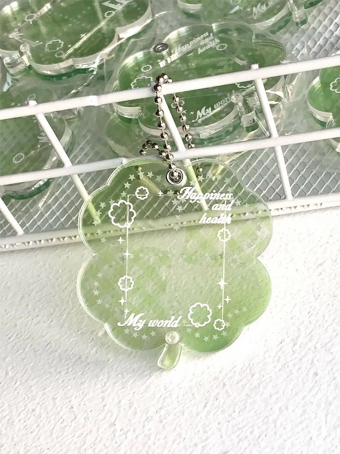 Acrylic four-leaf clover phone pendant keychain in blue, green and mint colours