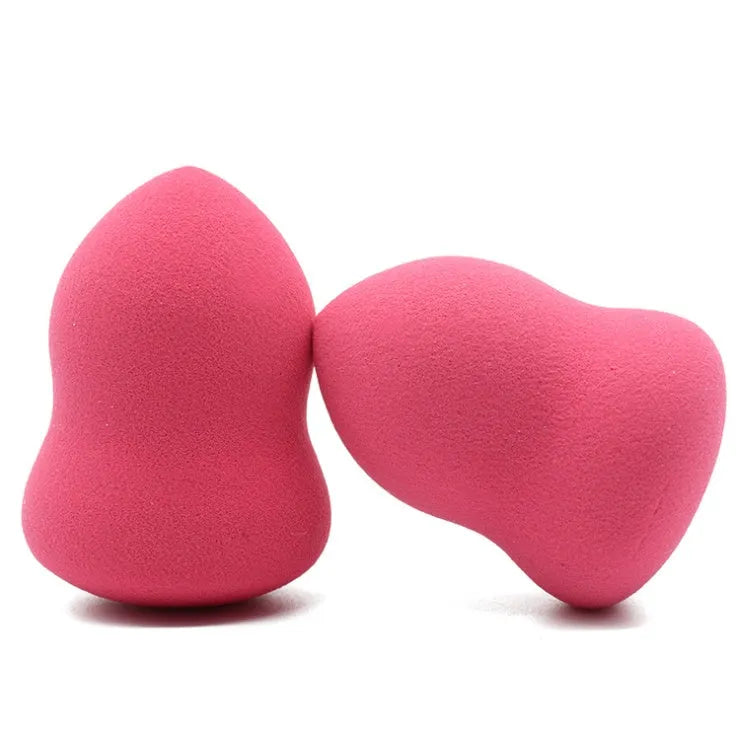 Pink makeup foundation sponge with hydrophilic non-latex material measuring 4cm by 4cm by 5.6cm