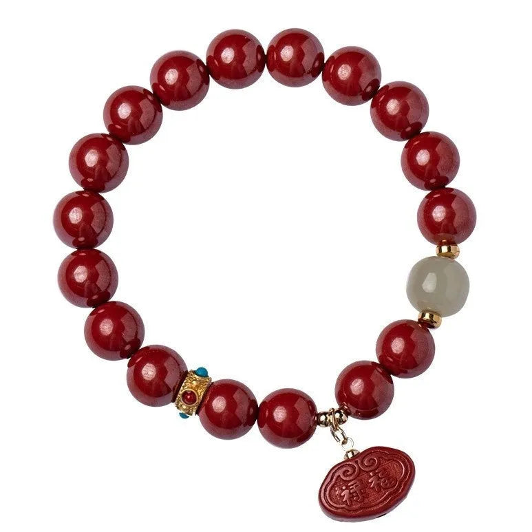 Natural cinnabar emperor sandstone bracelet with adjustable closure in 8mm or 10mm sizes