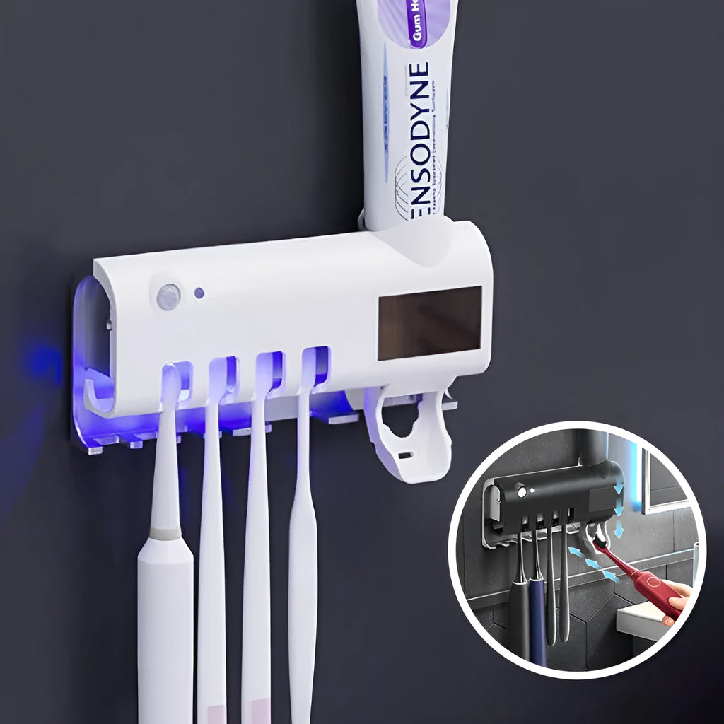 Black and white intelligent UV toothbrush steriliser with automatic toothpaste squeezer mounted on a bathroom wall.