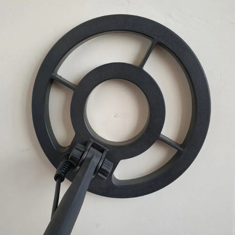 GC1028 professional metal detector with LCD display, black and yellow housing, and waterproof search coil