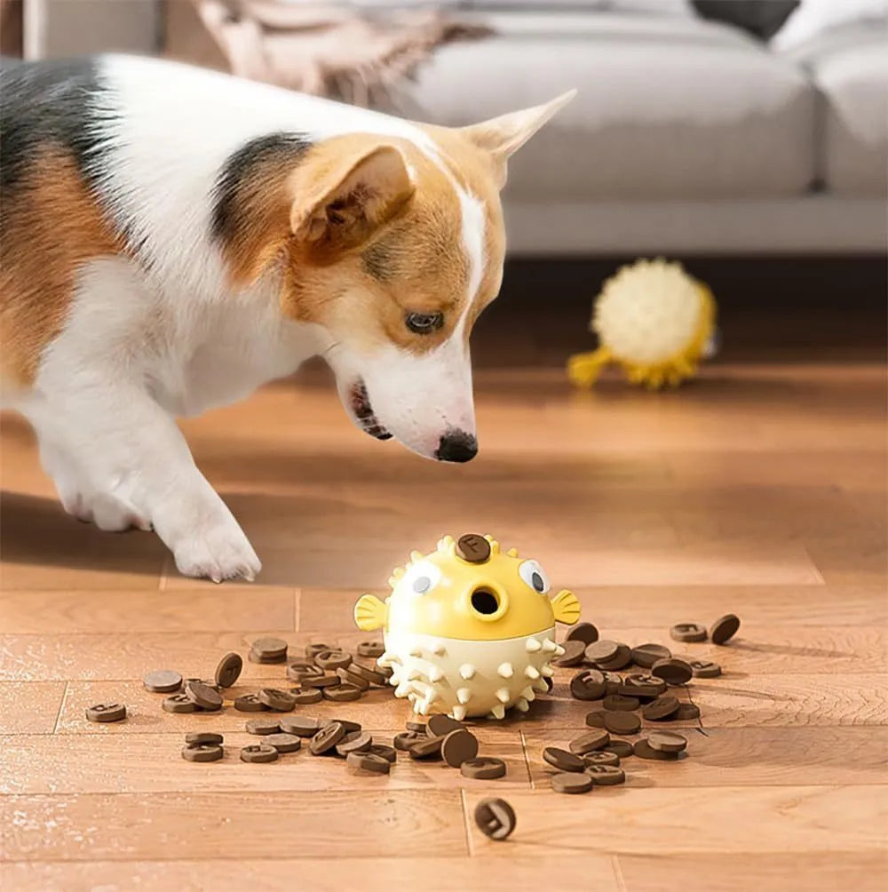 Fish-shaped TPR dog toy with treat dispensing function and bell sound for medium and large dogs