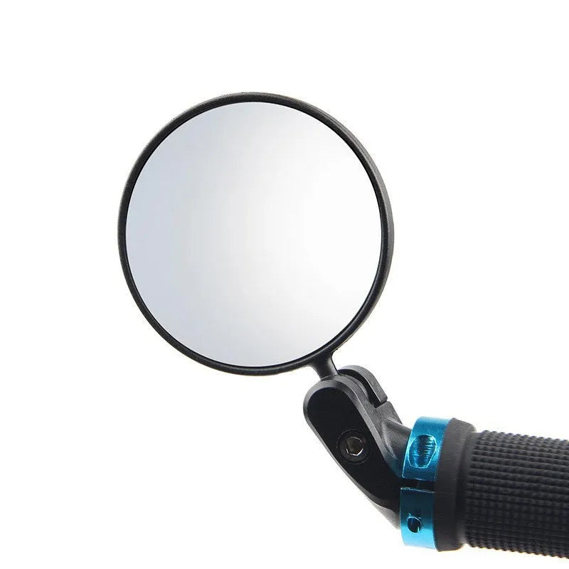 Black foldable convex rearview mirror extended on a table, showing its 7cm diameter and adjustable arm.