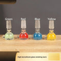 Coloured glass tobacco pipe with trumpet design measuring 7cm length