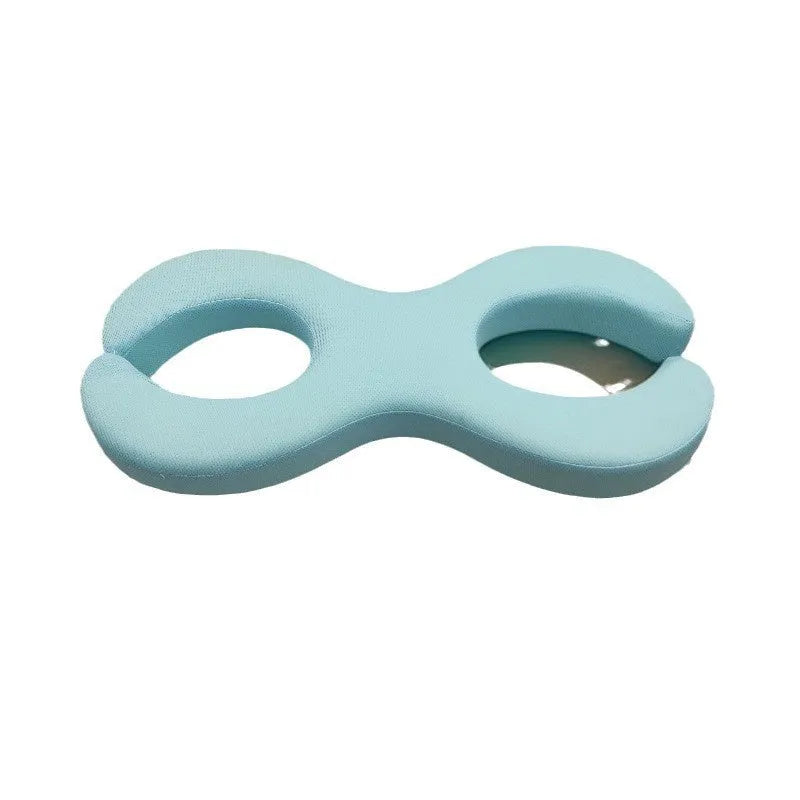 Cylindrical blue memory foam cervical traction pillow for neck support during sleep