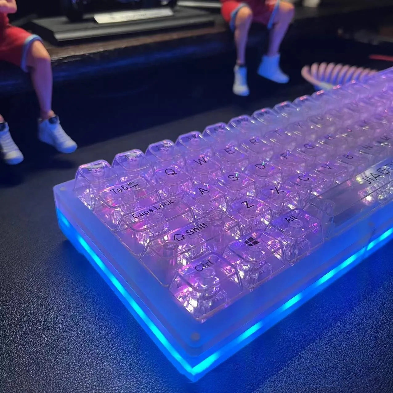 132 transparent plastic mechanical keyboard key caps laid out in grid pattern