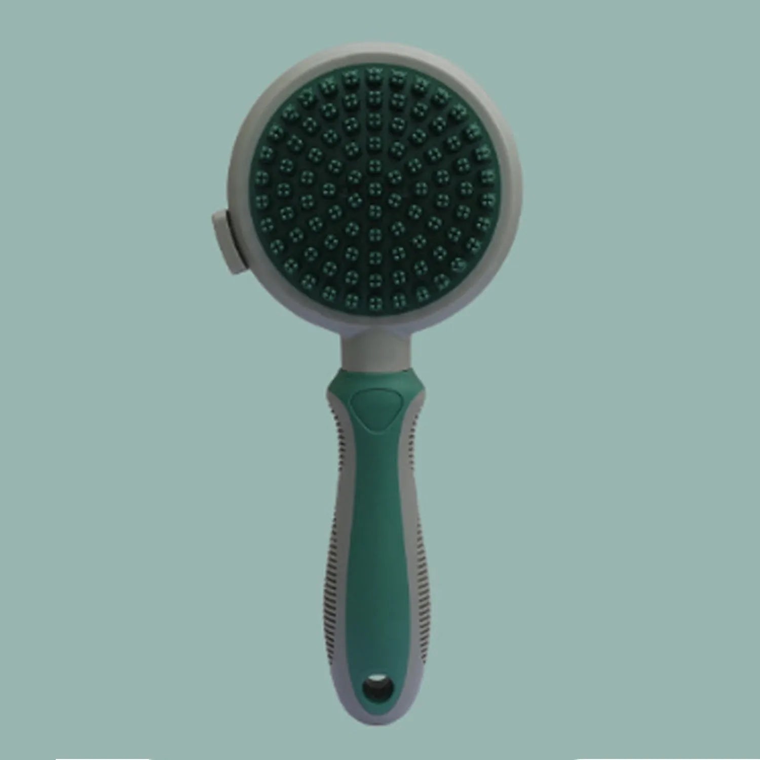Double-sided pink cat brush with release button and a separate black flea comb on a white background.