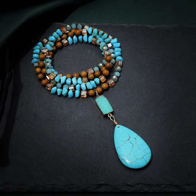 Turquoise blue water drop pendant necklace with heart shape design on mixed material ball bead chain