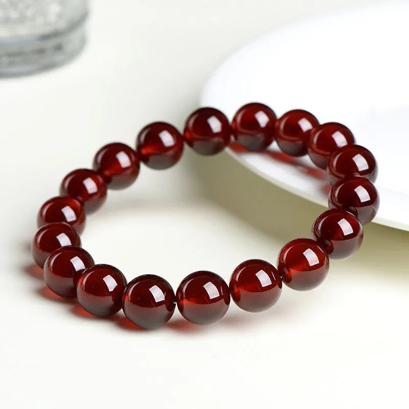 Natural orange red garnet ball crystal bracelet with traditional ruyi charm in retro style