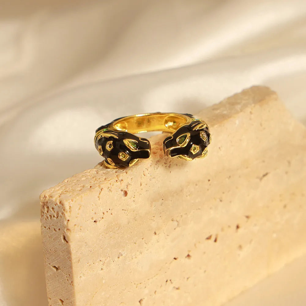 Black cheetah pattern open ring with geometric oil dripping design on copper