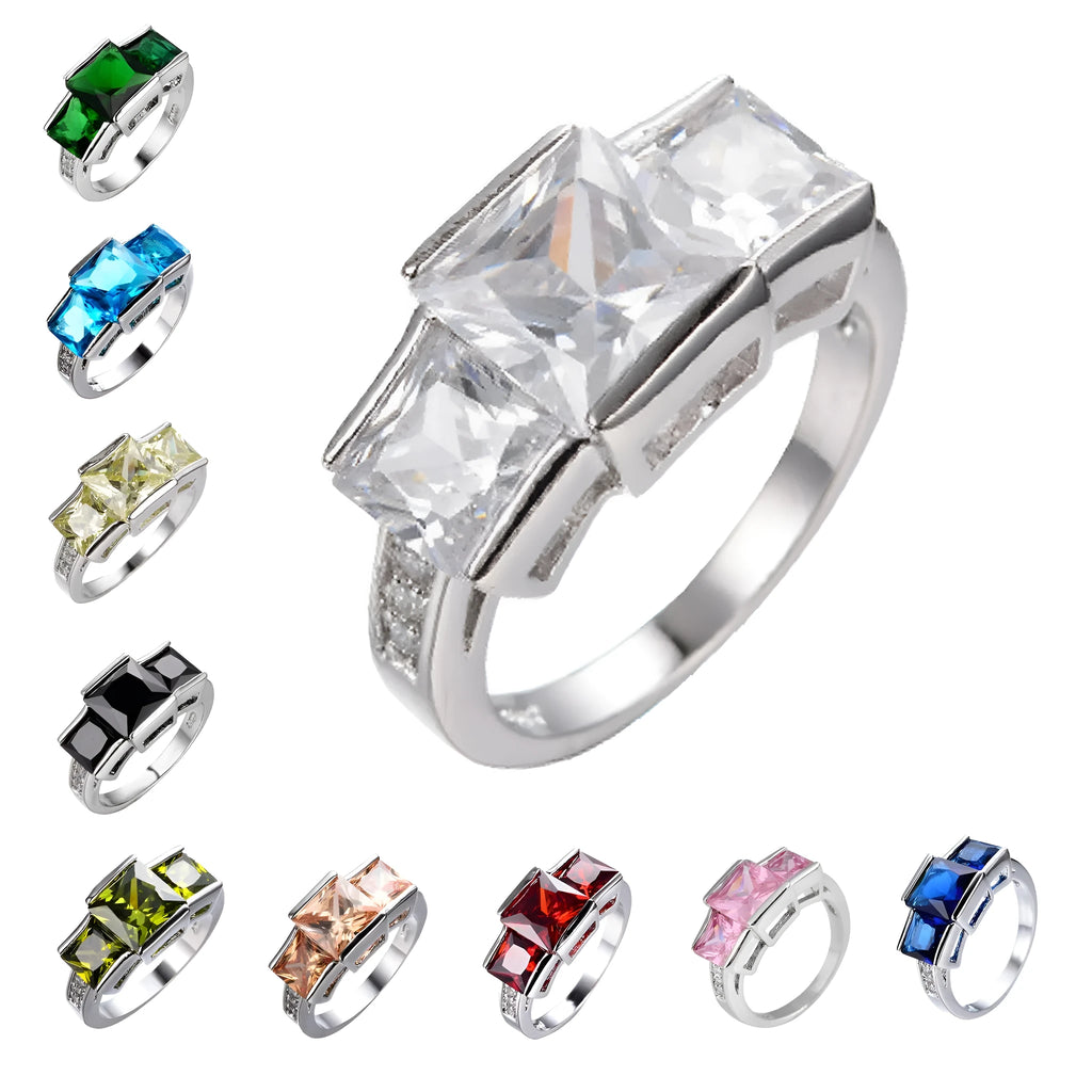 Copper ring ornament with geometric design in various colours including apple green, champagne and royal blue