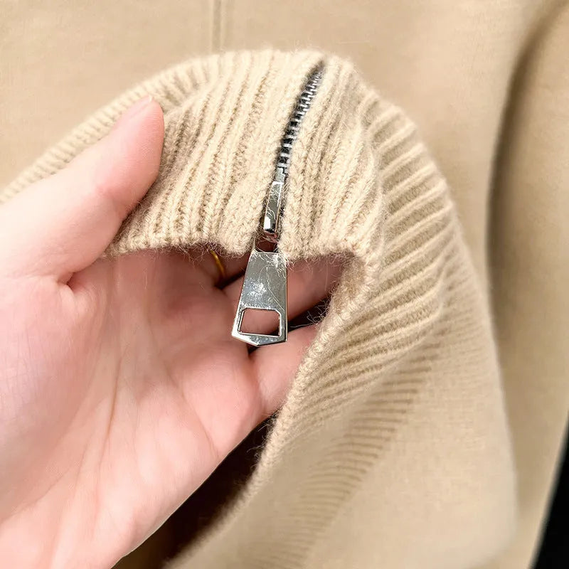 Men's loose fit knitted cardigan with a stand collar and full-length zip front in beige.