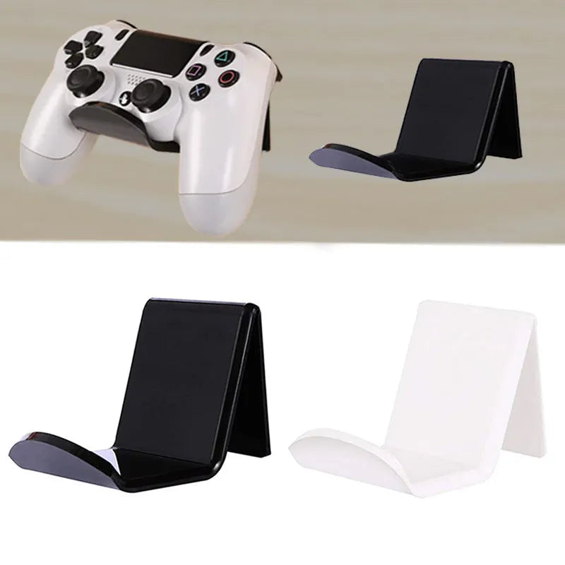 Universal plastic wall mount bracket for game controllers in black, white and transparent colours.
