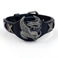 Black geometric leather bracelet with alloy eagle watch-buttom fastening showing tapered width design