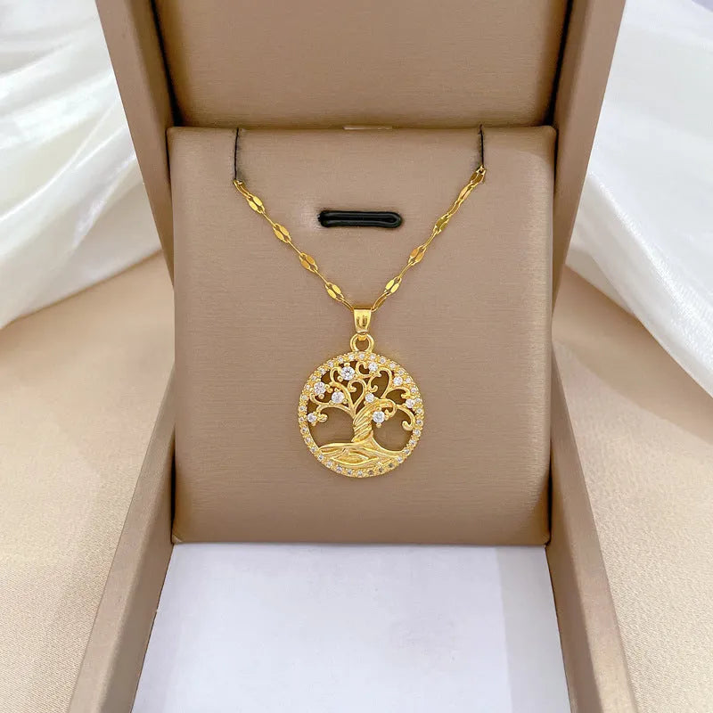 Gold-plated necklace with mother-of-pearl pendant and rhinestone cross design on adjustable lip chain
